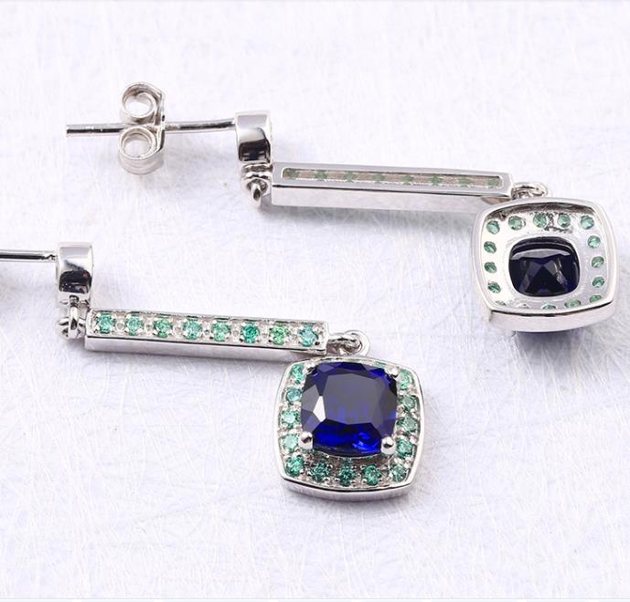 Pendientes de moissanita de moda chapados en plata de ley 925 con gema azul