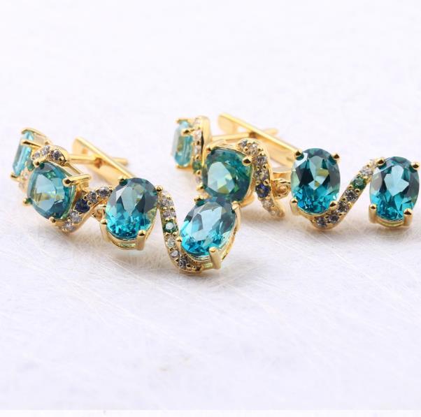 Pendientes de moda de plata de ley 925 con gema azul chapada en oro de 14 quilates